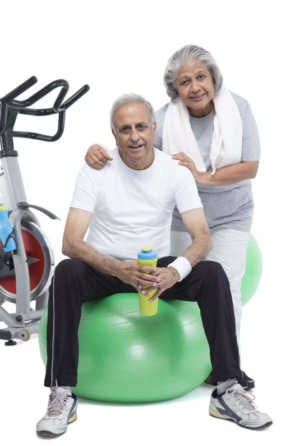 old couple working out in gym