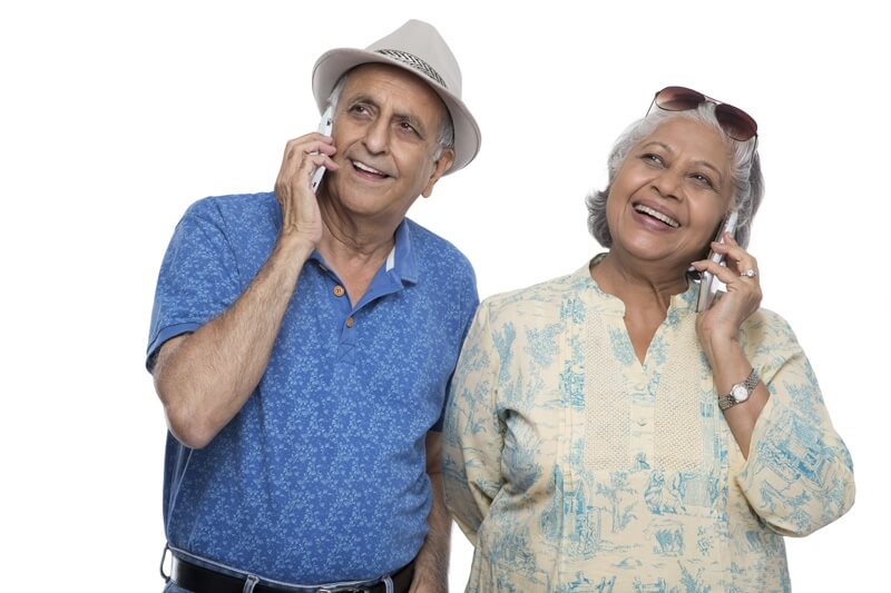 old couple talking on phone