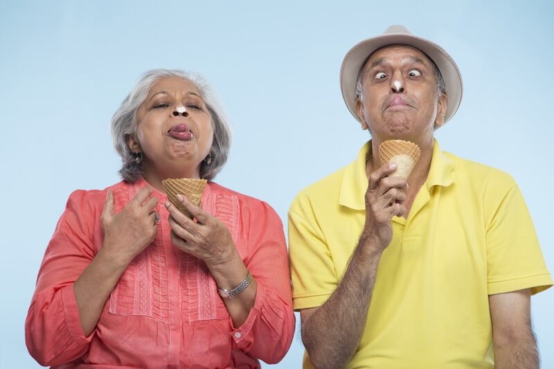 old couple enjoying ice cream 