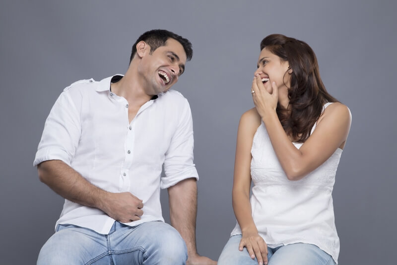 couple laughing together 