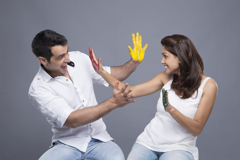couple with painted hands 