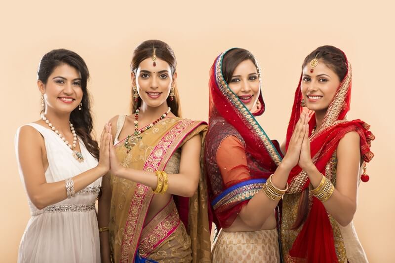 women from different religion smiling and posing