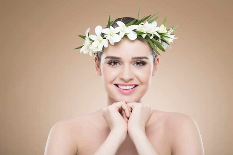 beautiful woman posing with flower crown 