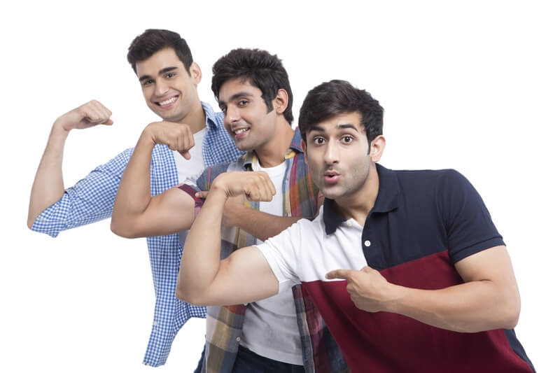 three friends showing biceps