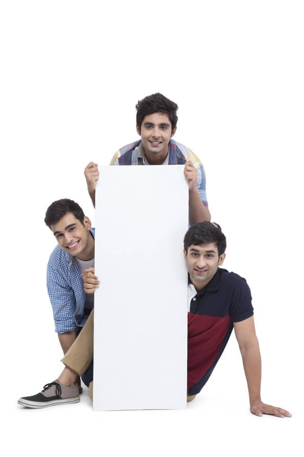 three friends posing with placard