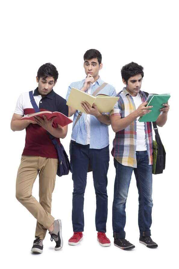 three college friends posing with assignments