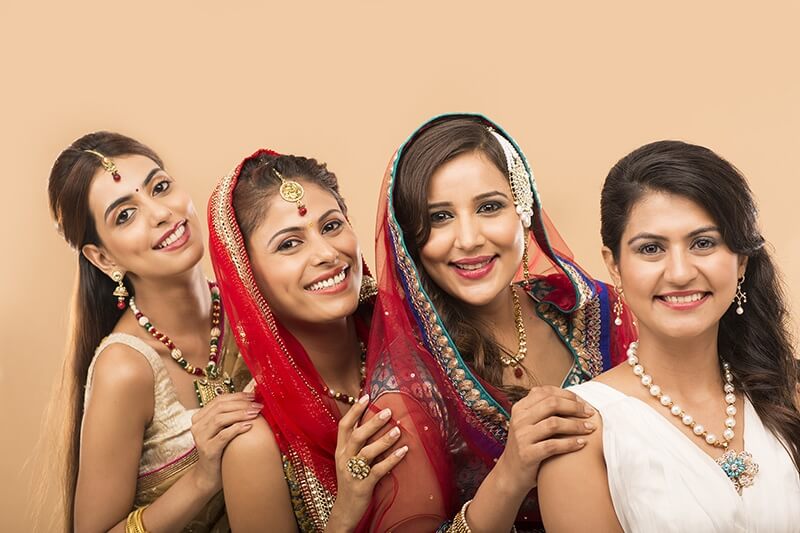 women from different religion smiling and posing