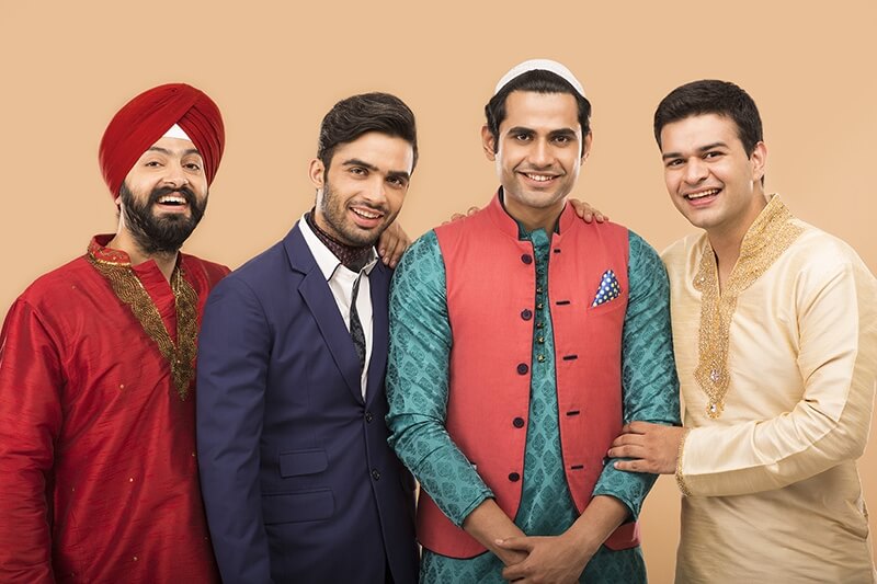 men from different religion smiling and posing