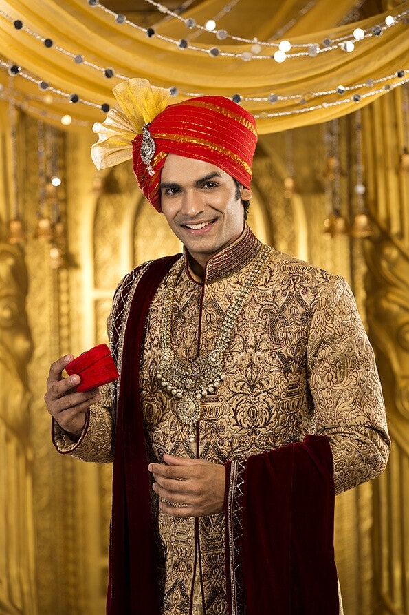 indian groom posing 