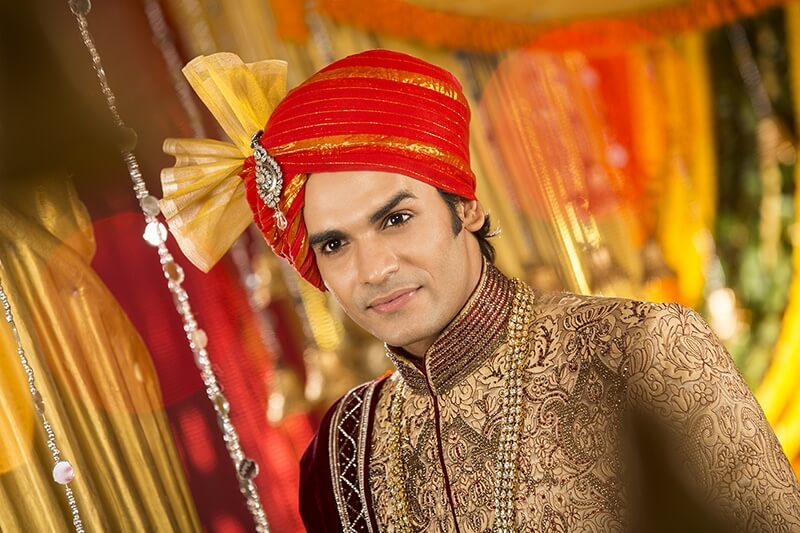 indian groom posing 