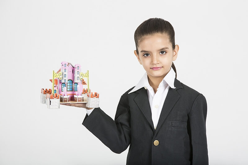 child with lego building
