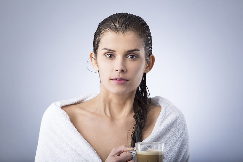 girl with tea after shower