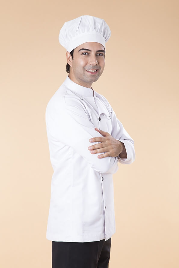 side pose of chef standing with arms crossed 