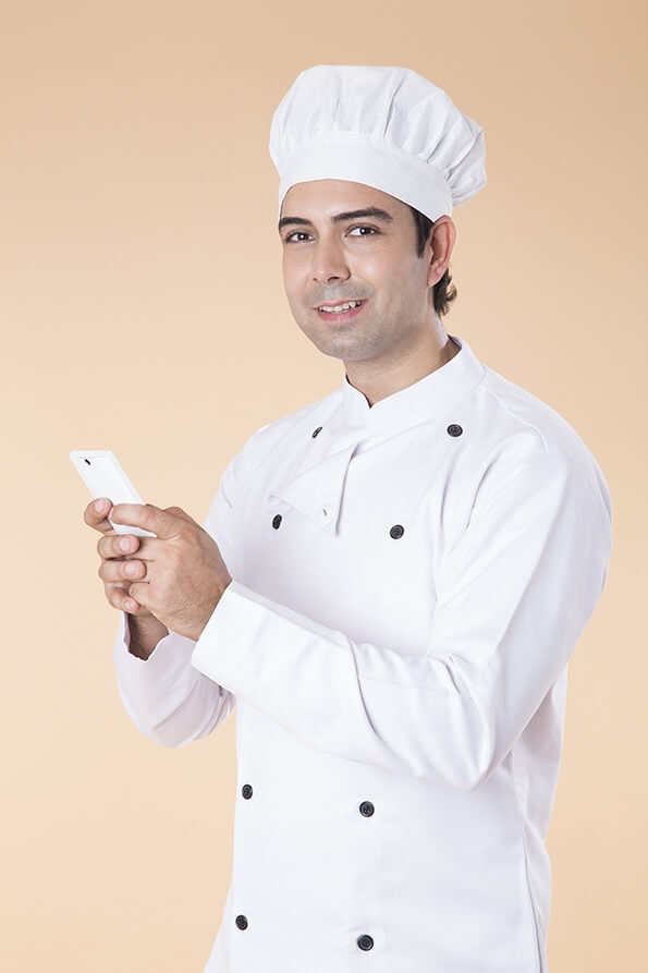 chef texting on mobile phone