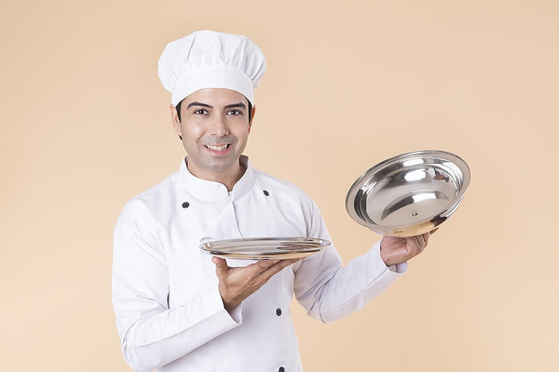chef with serving tray