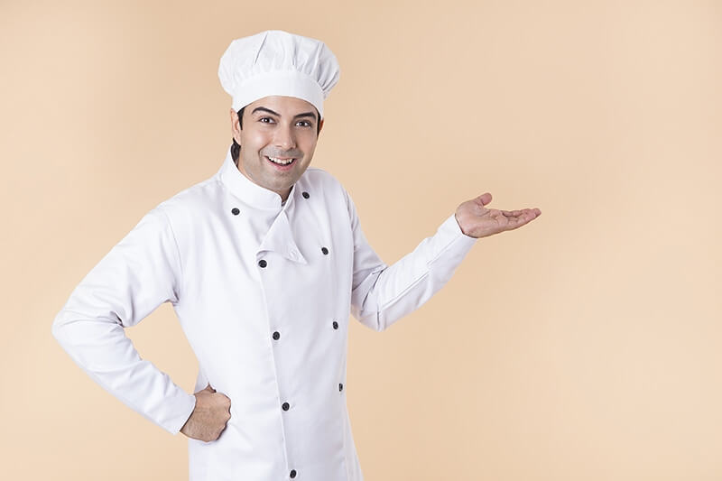chef pointing towards something 