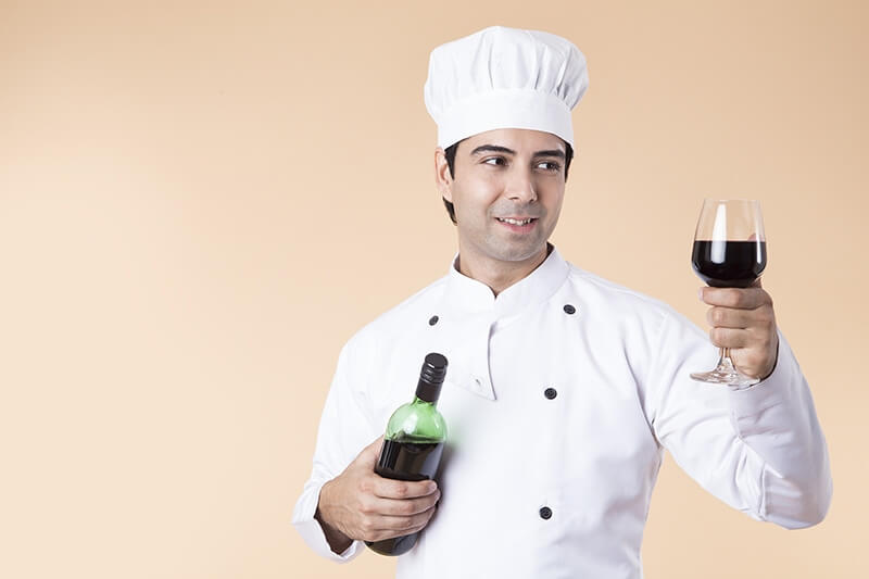 chef tasting wine 