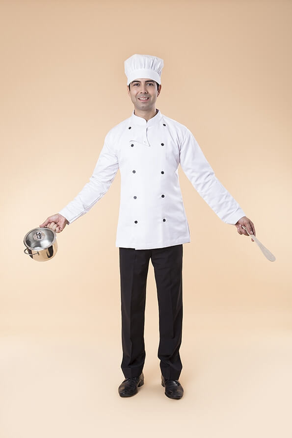 chef posing with utensil 