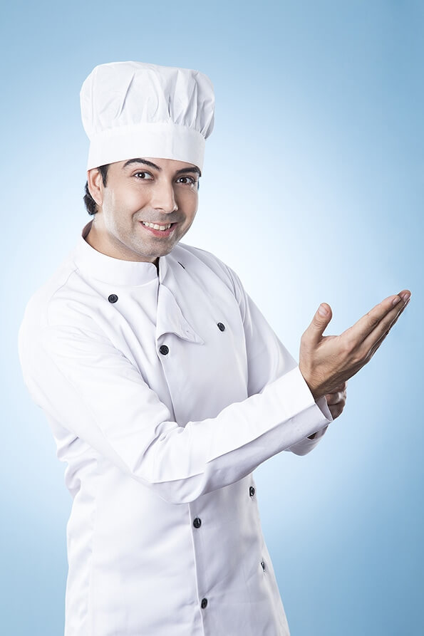 chef gesturing while posing