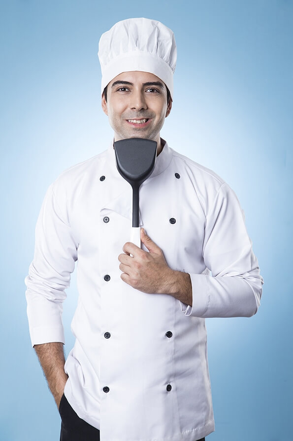 chef posing with spatula 