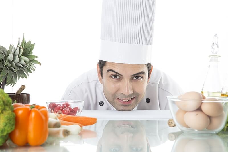 chef posing in kitchen