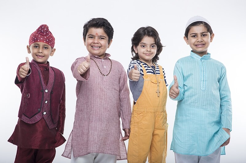 kids from different religions doing thumbs up