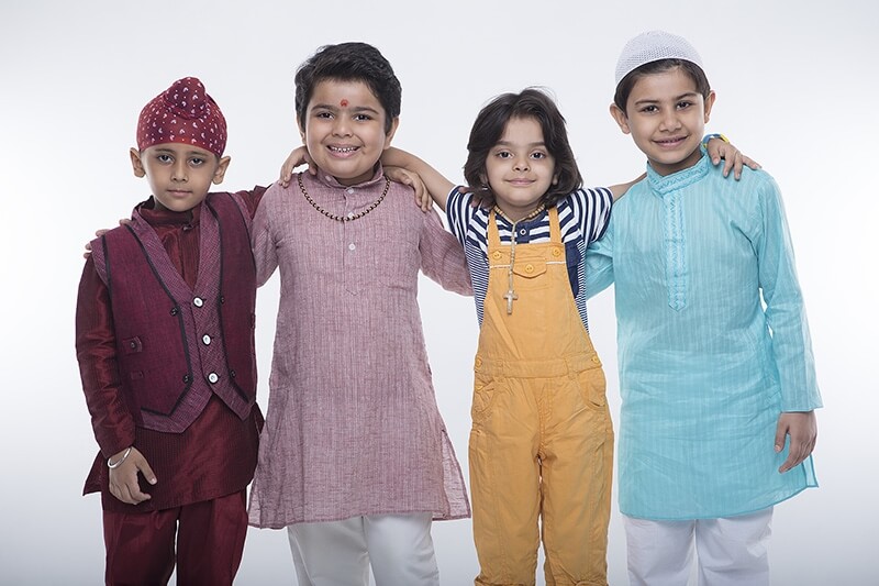 kids from different religions standing together 