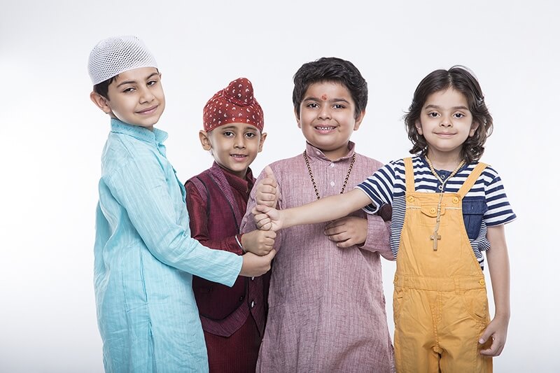 kids from different religions standing together 