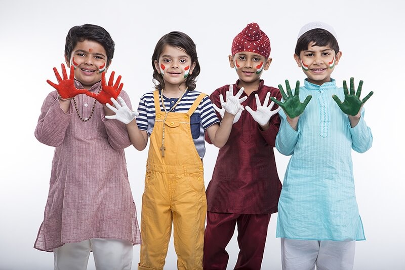kids from different religion with colourful hands 