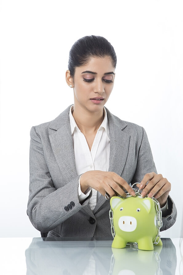 woman in formals with piggy bank 