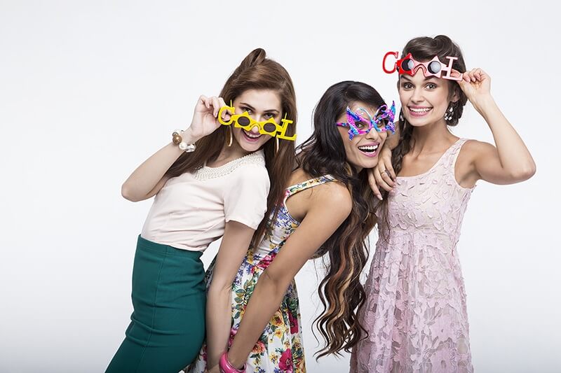 stylish girls wearing colourful sunglasses 