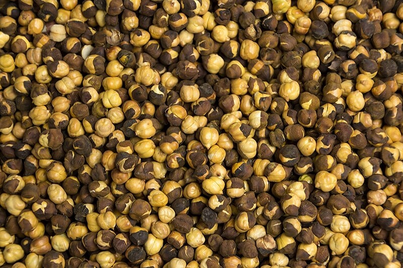 close up shot of roasted seeds of black gram