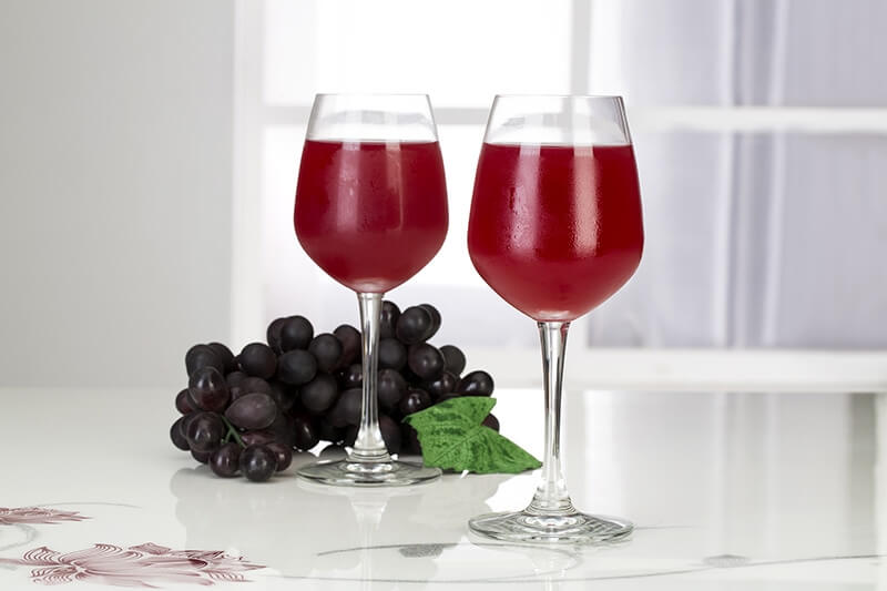 Red two wine glasses and grapes