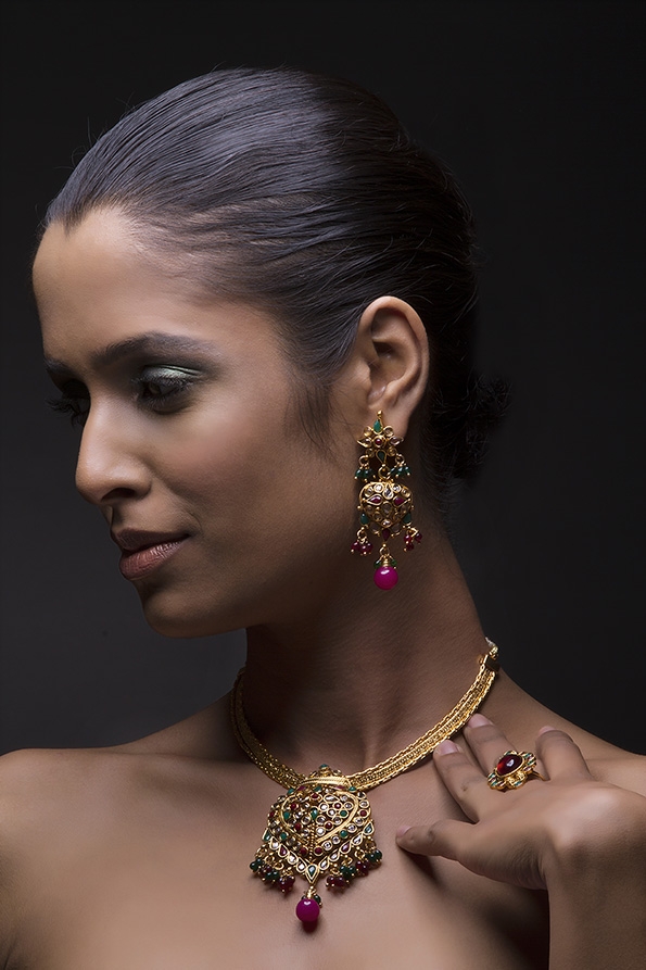 Woman flaunting her gold jewellery