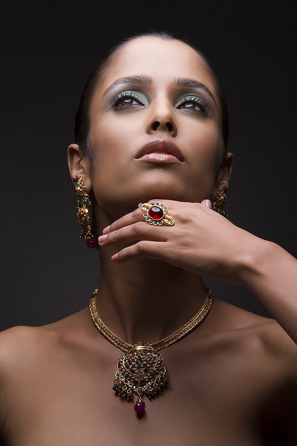 Woman flaunting her gold jewellery