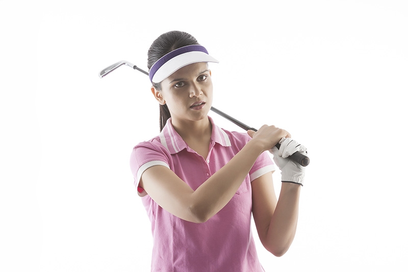 The young woman playing golf